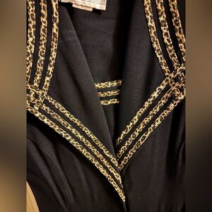 Black dress with just a touch of animal print.